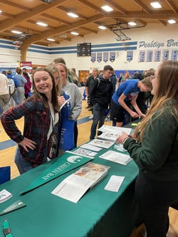 Students at Expo table